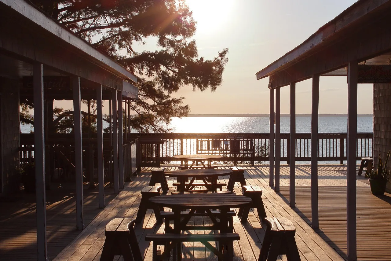 sunset, tables, chairs, tree, nature, fence, pier, deck, water, horizon. Deck and patio quality assurance: a closeout file audit
