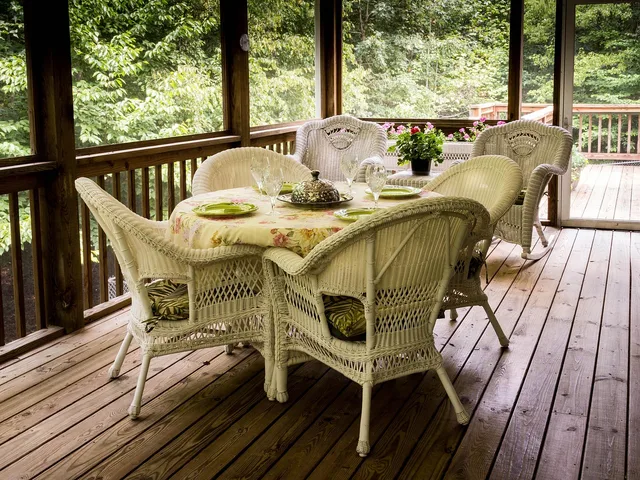 screened porch, back porch, deck, wicker chairs, wicker table, rocking chairs, picnic, table setting, table cloth, porch, entertain, brown table, brown rock, deck, deck, deck, deck, deck, porch. Deck maintenance contract pricing: what a 300 square foot wood deck quote includes